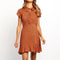 Robe orange fleurie