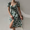 Robe Mi-Longue Fleurie Manches Courtes Bouffantes